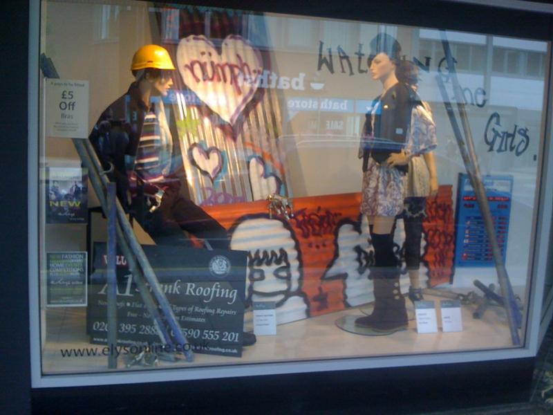 A1 Strank Roofing, Elys of Wimbledon main window display.